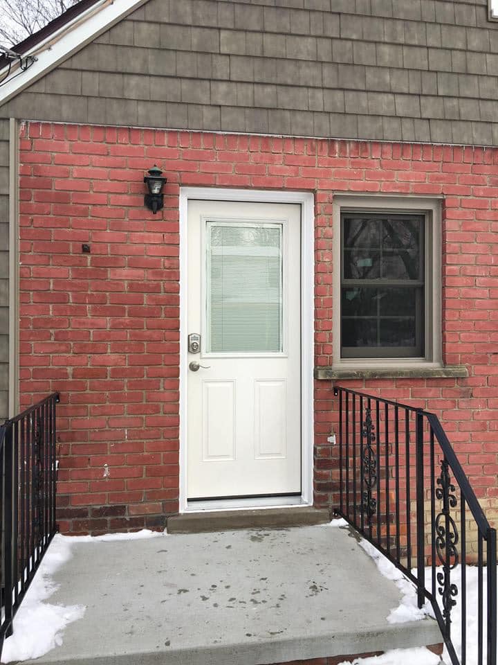 Exterior view of a custom front door installation