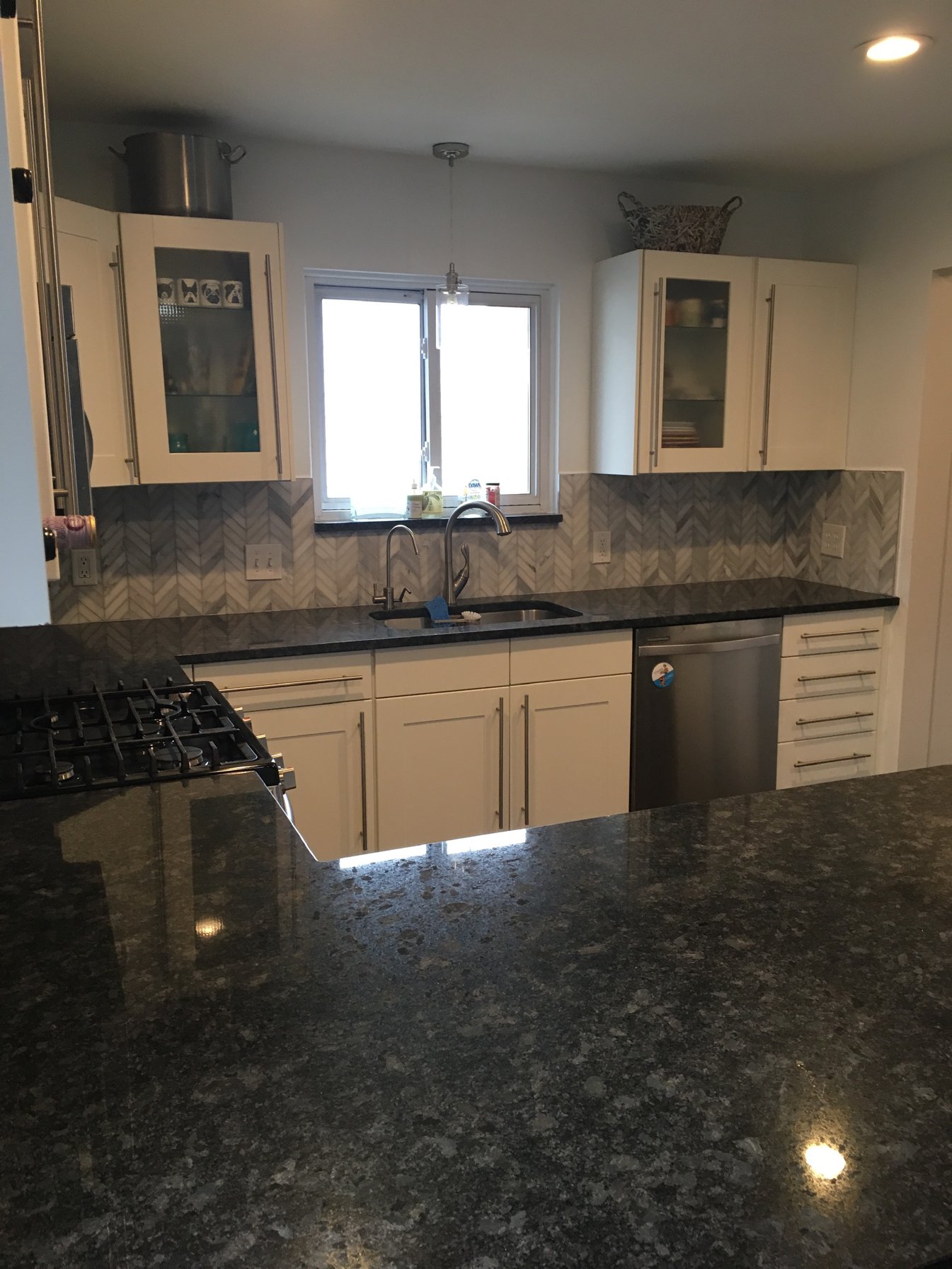 Close-up of a custom tile backsplash installation