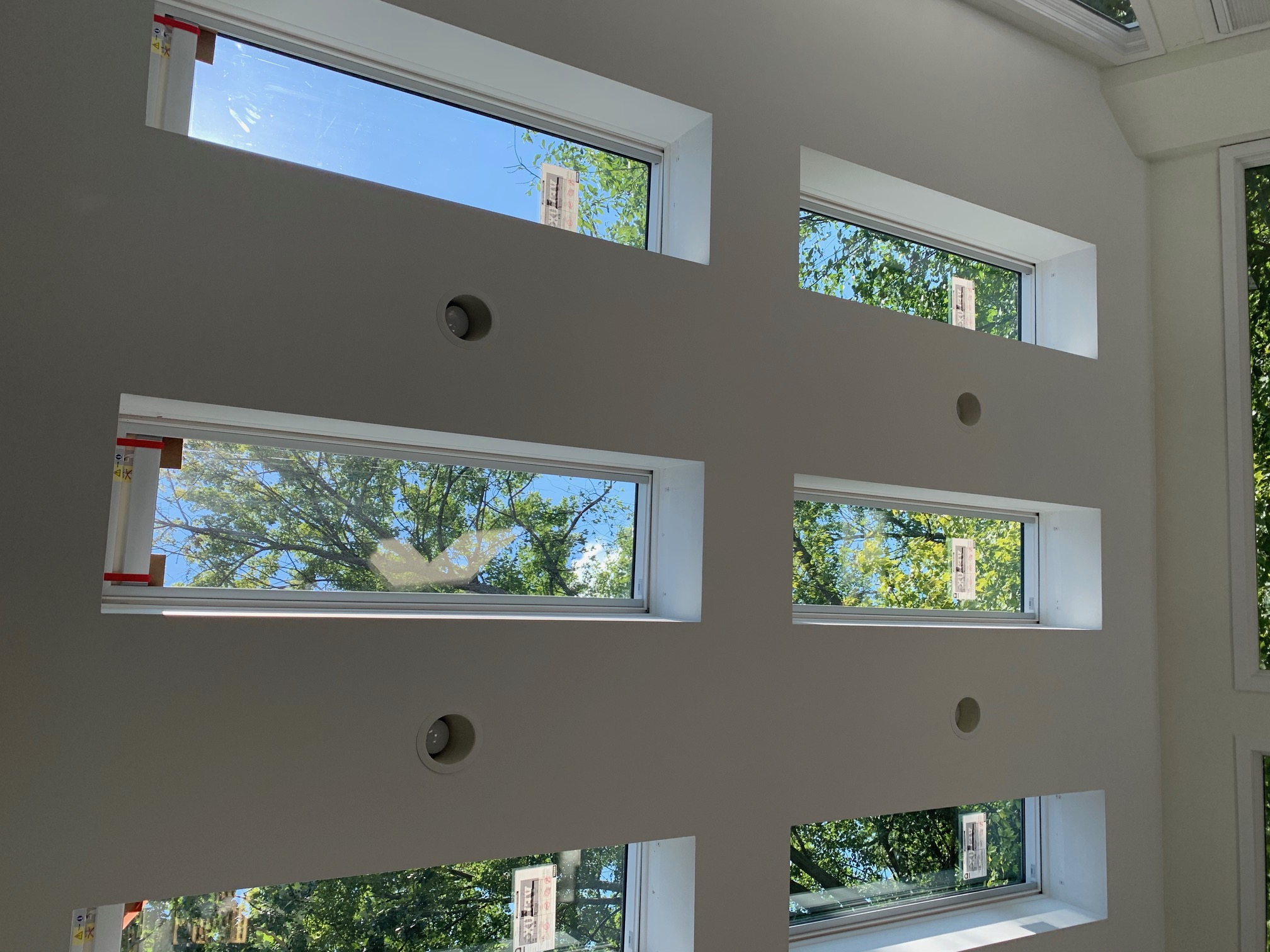 Interior view looking up at installed Velux skylights